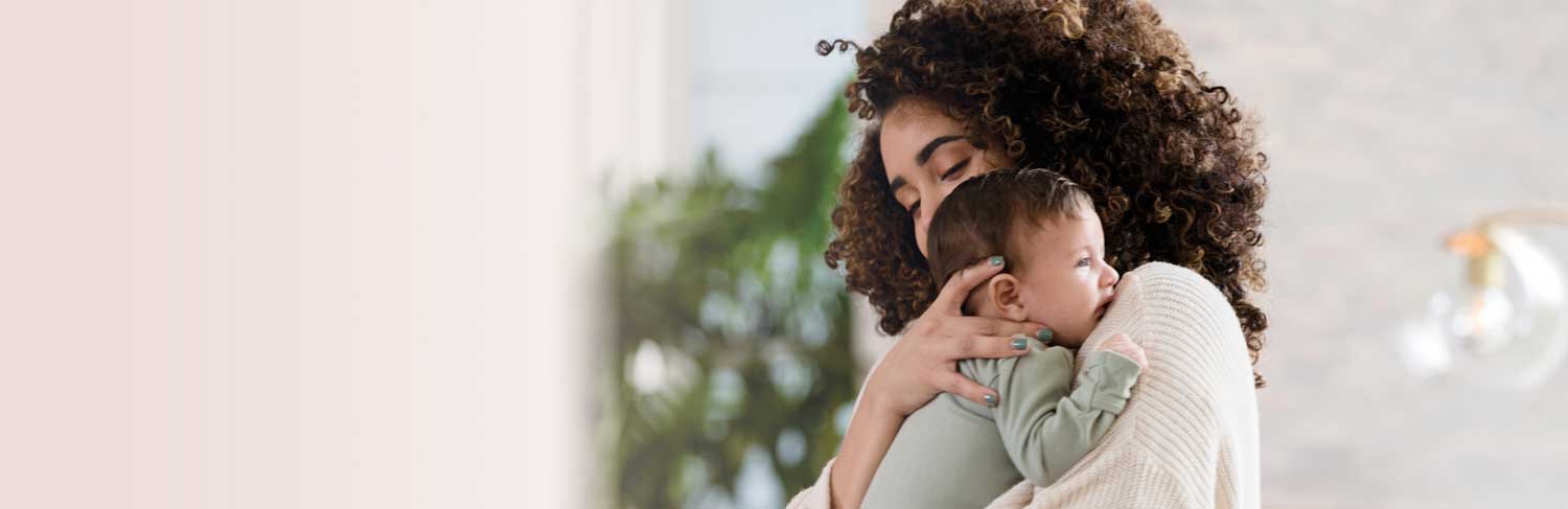 Mother holding her baby