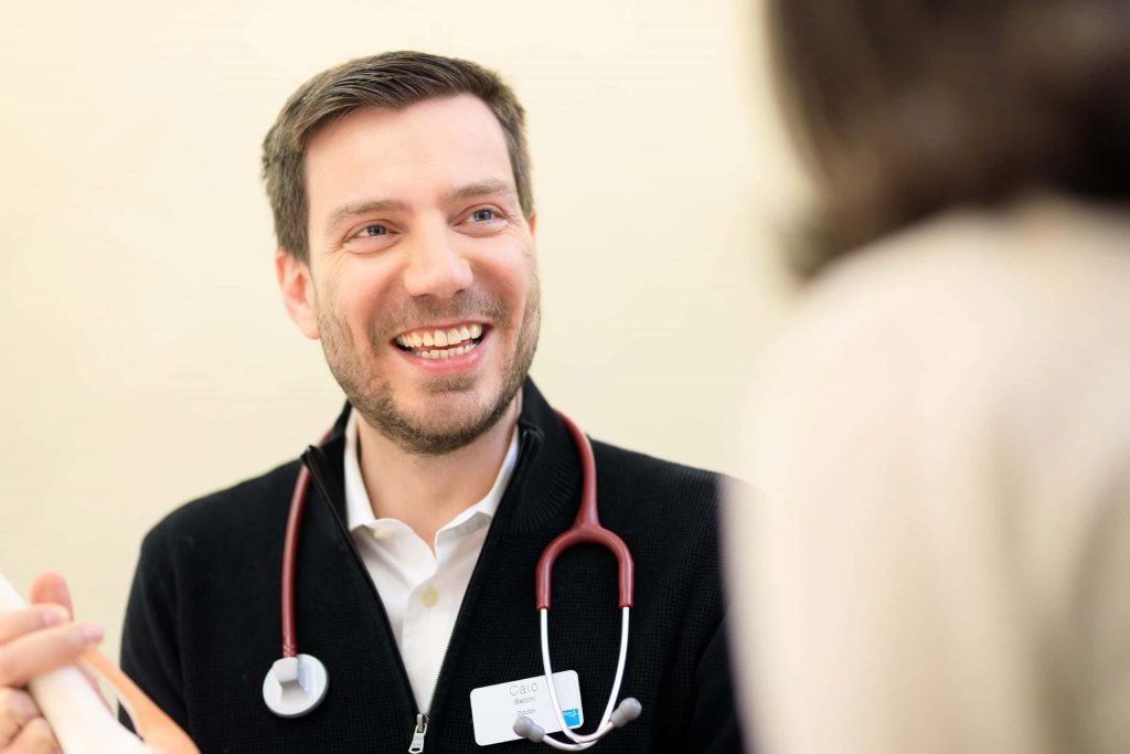 Picture of a doctor smiling at a patient