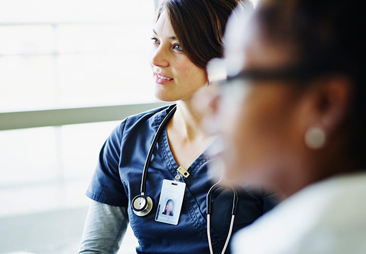Picture of a nurse within the team at the hospital