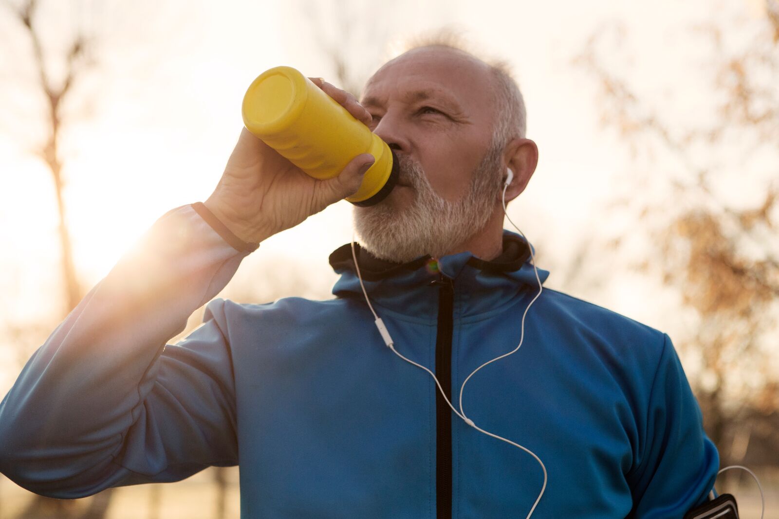 Healthy man drinking water