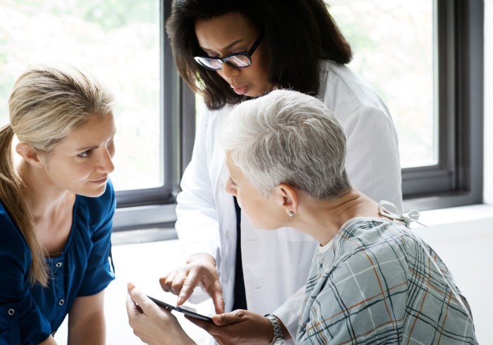 A patient meeting with a consultant; ?>