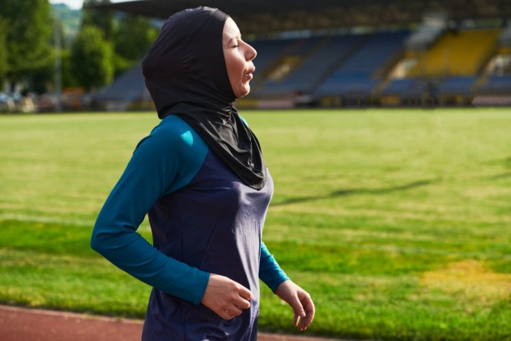 Picture of a woman exercising on a running track