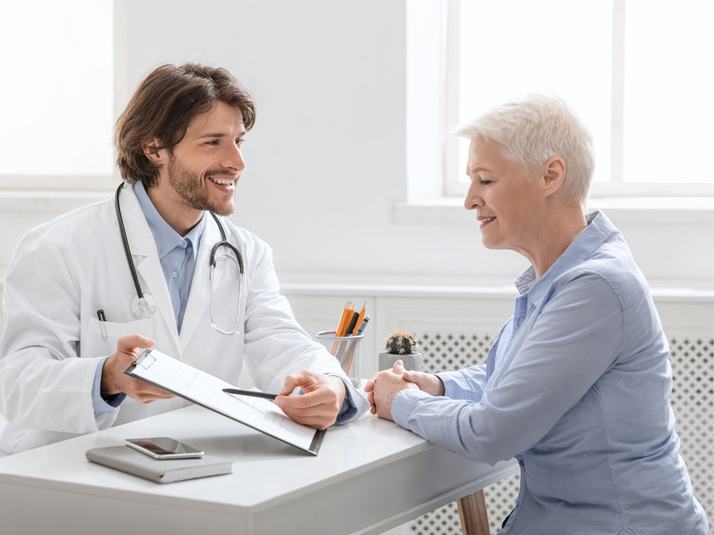 Patient talking to a GP