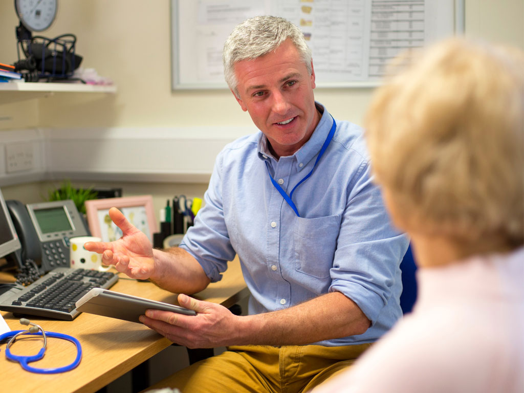 Patient talking to a GP